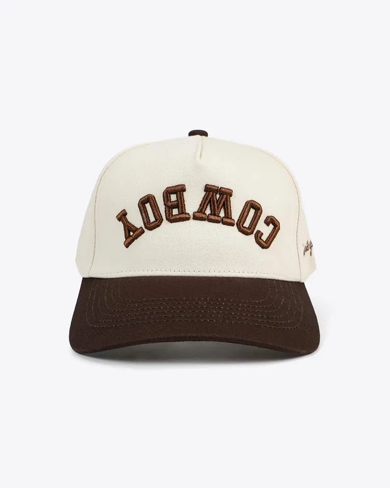 Baseball cap with 'Cowboy' text on a white background
