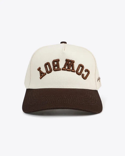 Baseball cap with 'Cowboy' text on a white background